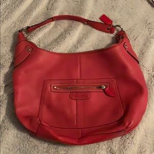 Slightly used pink coach bag.